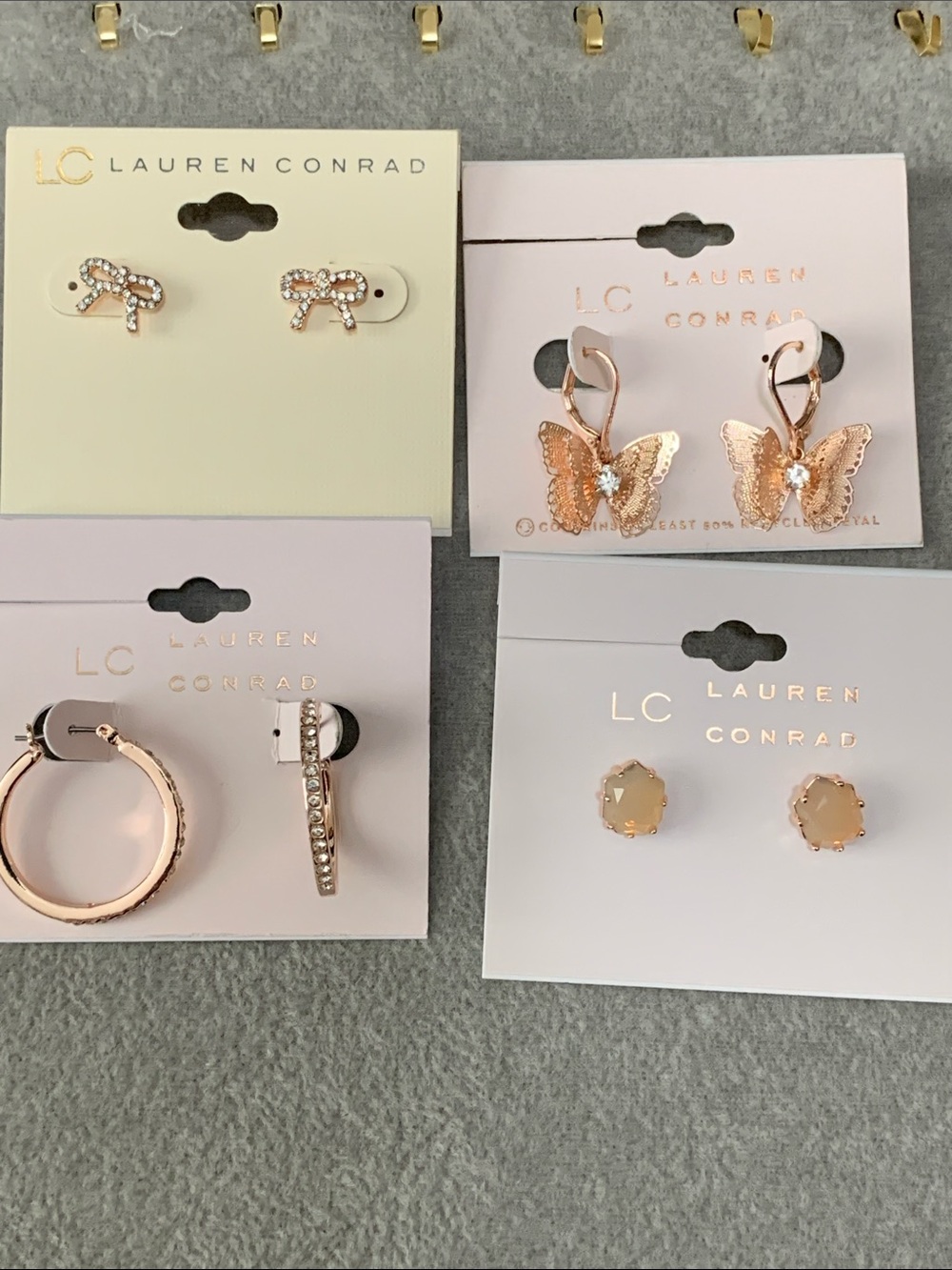 NWT LC Lauren Conrad 4 pair set of rose gold tone earrings